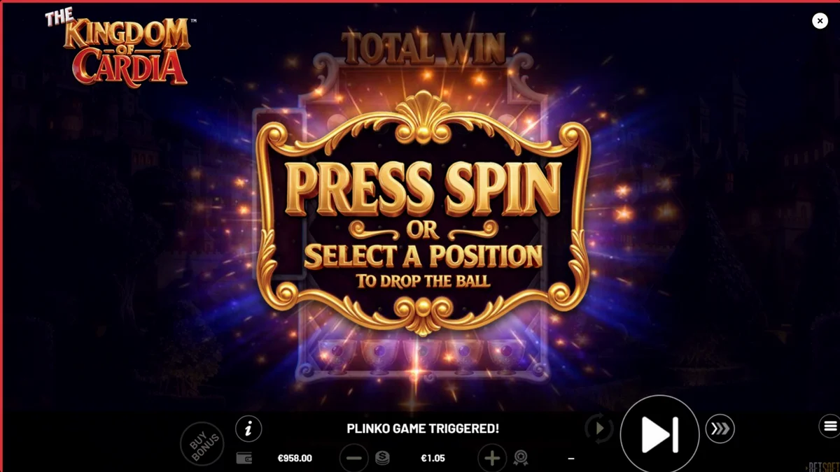 The Kingdom of Cardia slot game interface showing fantasy garden theme and card symbols
